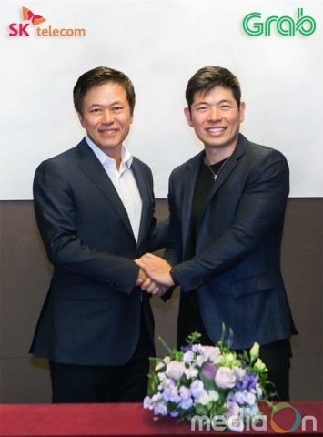SKT, 동남아 ‘그랩’ 공유 차량에 T맵 기술 심는다